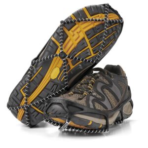 Yaktrax traction cleats on hiking boots in snow