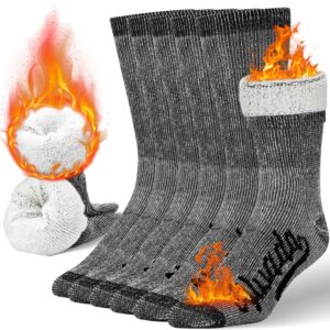 Alvada merino wool hiking socks on snowy trail